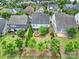 Aerial view of the backyard showing outdoor seating and fire pit with mature landscaping in a desirable neighborhood at 295 Helton Ln, Fort Mill, SC 29708