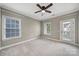 Bedroom featuring neutral walls, carpeted floors, a ceiling fan, and access to an outdoor patio at 295 Helton Ln, Fort Mill, SC 29708