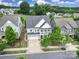 Stunning home exterior boasts a two-car garage, landscaped front yard, and covered porch, creating a welcoming curb appeal at 295 Helton Ln, Fort Mill, SC 29708