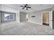 Large main bedroom featuring neutral walls, carpeted floor, and a large window with natural light at 295 Helton Ln, Fort Mill, SC 29708