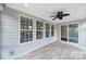Sun room with tile floors, ceiling fan and large windows for plenty of natural light at 295 Helton Ln, Fort Mill, SC 29708