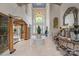 Elegant two-story foyer with marble floors, arched doorway, and decorative chandelier at 2971 Kaneland Ct, Rock Hill, SC 29732