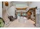 Grand foyer featuring a spiral staircase, marble floors, and sophisticated decor at 2971 Kaneland Ct, Rock Hill, SC 29732