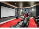 Enjoy movies in this cozy home theater, with a large screen, comfortable seating, and fun movie memorabilia at 2971 Kaneland Ct, Rock Hill, SC 29732