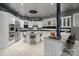 Gourmet kitchen featuring white cabinets, stainless steel appliances, a center island, and bar seating at 2971 Kaneland Ct, Rock Hill, SC 29732