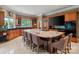Gourmet kitchen features a large island with seating, custom cabinets, and built-in appliances at 2971 Kaneland Ct, Rock Hill, SC 29732