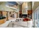 Spacious living room features a fireplace, second-floor balcony, and large windows for ample natural light at 2971 Kaneland Ct, Rock Hill, SC 29732