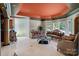 Elegant living area with unique glass block wall, marble floors, and stylish furnishings at 2971 Kaneland Ct, Rock Hill, SC 29732