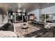 Cozy living area features plush sectional seating, a TV, and access to the home theater at 2971 Kaneland Ct, Rock Hill, SC 29732