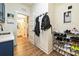 Mud room featuring storage, coat hooks, and a shoe rack for easy organization at 3020 Quiet Ln, Iron Station, NC 28080