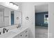 Bathroom features a double sink vanity with modern fixtures and large mirror at 3103 Suggs St, Belmont, NC 28012