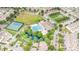 Expansive aerial view of a community featuring a pool, tennis court, pond, and green spaces surrounded by residential homes at 3105 Bonterra Blvd, Indian Trail, NC 28079