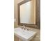 Close-up of a bathroom vanity with a framed mirror and faucet at 3105 Bonterra Blvd, Indian Trail, NC 28079