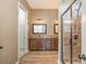 Bathroom featuring double vanity, granite countertops, and modern glass shower enclosure at 3105 Bonterra Blvd, Indian Trail, NC 28079