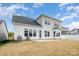 Home exterior featuring ample windows, neutral paint, and a well manicured lawn at 3105 Bonterra Blvd, Indian Trail, NC 28079