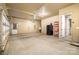 Spacious garage with ample storage, featuring a side entry door and interior access at 3105 Bonterra Blvd, Indian Trail, NC 28079