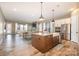 Lovely kitchen view highlighting a center island with a sink and stainless steel appliances at 3105 Bonterra Blvd, Indian Trail, NC 28079