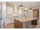 Spacious kitchen features a large center island, stainless appliances, and ample cabinet space at 3105 Bonterra Blvd, Indian Trail, NC 28079