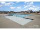 Community pool with lane markers and ample concrete area for sunbathing at 3105 Bonterra Blvd, Indian Trail, NC 28079