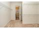Spacious walk-in closet featuring wire shelving and carpeted floors at 3105 Bonterra Blvd, Indian Trail, NC 28079