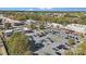 This aerial view showcases retail stores, ample parking, and neighborhood trees, offering convenient shopping experiences at 3114 Stelfox St, Charlotte, NC 28262
