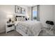 Comfortable bedroom with neutral tones and a serene atmosphere, perfect for relaxing and unwinding at 3114 Stelfox St, Charlotte, NC 28262