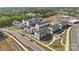Aerial view of new construction townhomes with modern architecture and well-maintained landscaping at 3118 Stelfox St, Charlotte, NC 28262