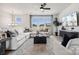 Bright and airy living area boasts ample natural light, sleek furnishings, and contemporary design at 3118 Stelfox St, Charlotte, NC 28262