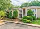 Charming two-story condo building with a well-maintained front yard and inviting entrance at 3308 Selwyn Farms Ln # 2, Charlotte, NC 28209