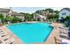 Community pool showcasing refreshing blue water and inviting lounge chairs, perfect for relaxation and recreation at 3308 Selwyn Farms Ln # 2, Charlotte, NC 28209