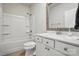 Bright bathroom featuring a bathtub and a single sink at 3833 Isenhour Rd, Kannapolis, NC 28081