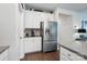 Bright kitchen features stainless steel appliances and white cabinets for a clean aesthetic at 3833 Isenhour Rd, Kannapolis, NC 28081