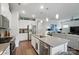 Bright kitchen featuring stainless steel appliances, a large island, and an open layout at 3833 Isenhour Rd, Kannapolis, NC 28081