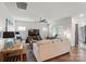 Comfortable living room features ample seating, a ceiling fan, and a large television for entertainment at 3833 Isenhour Rd, Kannapolis, NC 28081