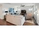 Spacious living room with stylish decor, neutral walls, and modern lighting, creating a cozy ambiance at 3833 Isenhour Rd, Kannapolis, NC 28081