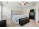 Bright main bedroom featuring a tray ceiling, and neutral decor at 3833 Isenhour Rd, Kannapolis, NC 28081