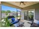 Enjoy outdoor living with this home's screened-in porch featuring comfortable seating and backyard views at 3833 Isenhour Rd, Kannapolis, NC 28081