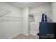 Walk-in closet featuring multiple shelves for storage at 3833 Isenhour Rd, Kannapolis, NC 28081