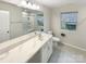 Bright bathroom featuring a tub, shower, and spacious vanity at 4105 Galloway Park Dr, Charlotte, NC 28262