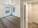 Bedroom featuring carpeted floors, bright windows and a closet for clothing storage at 4105 Galloway Park Dr, Charlotte, NC 28262