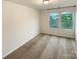 Carpeted bedroom providing ample natural light and views of the outdoors at 4105 Galloway Park Dr, Charlotte, NC 28262