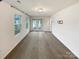 Large bonus room features windows and French doors leading to outdoor deck at 4105 Galloway Park Dr, Charlotte, NC 28262