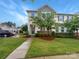 Charming two-story home featuring a manicured lawn and stone accents at 4105 Galloway Park Dr, Charlotte, NC 28262