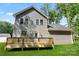 A two-story home with gray siding and a wood deck stands in a manicured green lawn at 4541 Kings Ct, Hickory, NC 28602