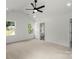 Bright bedroom with large windows overlooking the front yard at 4541 Kings Ct, Hickory, NC 28602