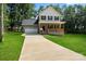 Beautiful two-story house with a front porch, garage, and well-maintained lawn at 4541 Kings Ct, Hickory, NC 28602
