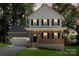 Charming two-story home with a welcoming front porch and manicured lawn at 4541 Kings Ct, Hickory, NC 28602