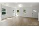 A spacious living area with multiple windows offers abundant natural light at 4541 Kings Ct, Hickory, NC 28602