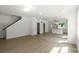 Open-concept living space showing the staircase, entryways, and a bright modern kitchen at 4541 Kings Ct, Hickory, NC 28602