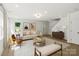 Bright living room featuring neutral décor, a stylish rug, and ample natural light at 4541 Kings Ct, Hickory, NC 28602